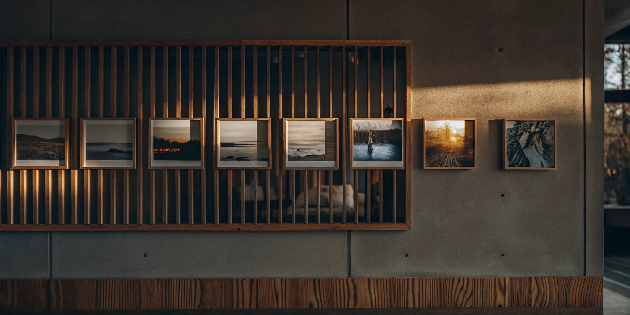 A stylish magnetic photo display for a wall with a creative arrangement of photos.