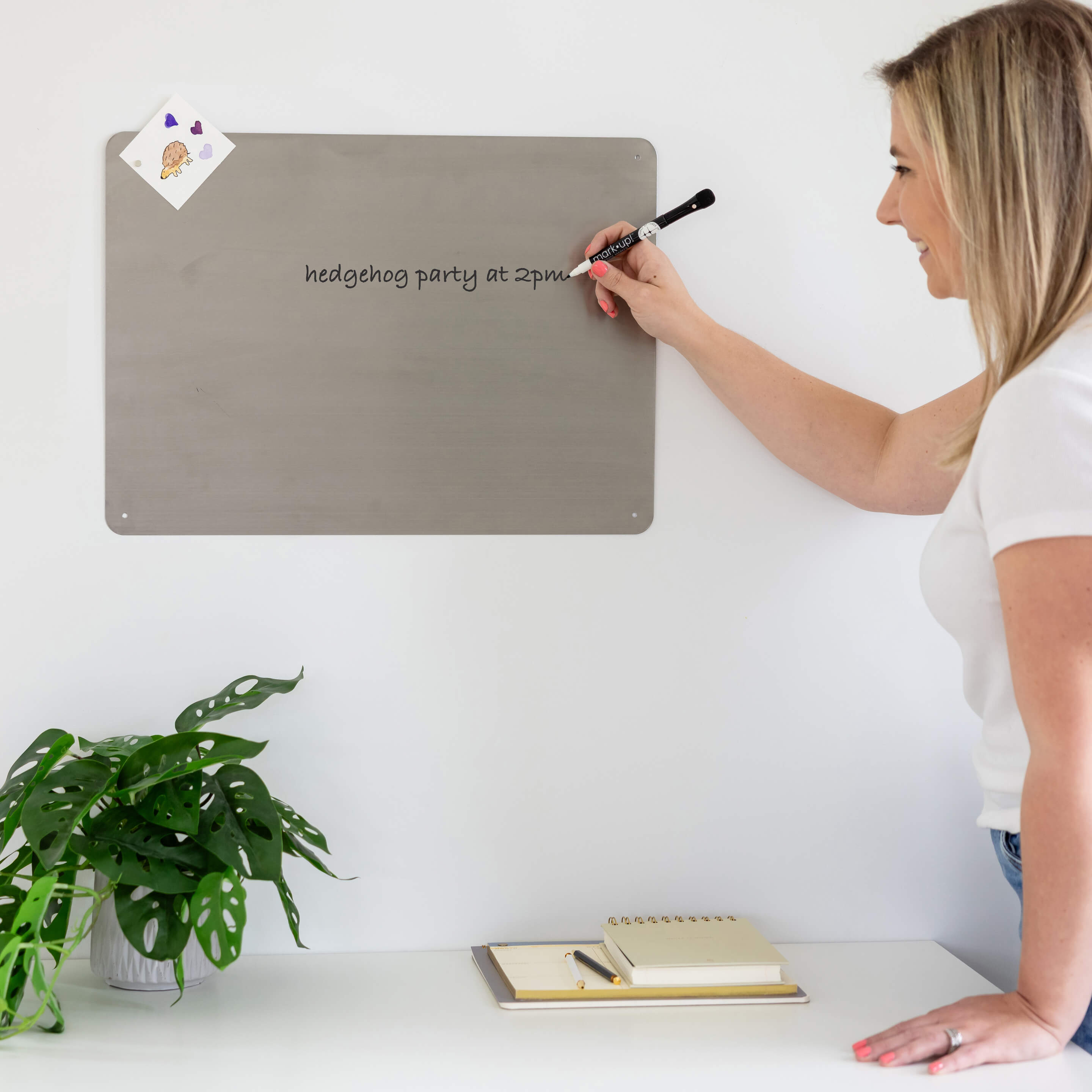 large stainless dry·erase board